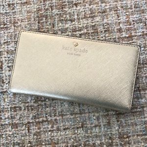 Kate Spade gold bifold wallet